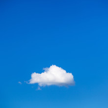 White Little Cloud In The Summer Blue Sky