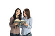 © alexbrylovhk - Young women read book on white background.Image of two girls dressed in checkered red blue striped brown shirts jeans casual style keeping large old book and reading it expressing bright emotions