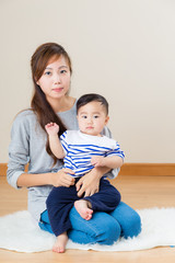 Asian young mother with her son