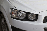 Fototapeta Miasta - the right headlight of a car