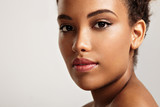Fototapeta Londyn - pretty black woman's portrait. ideal skin