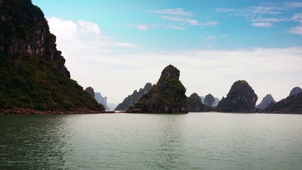 Wall Mural - Halong Bay Vietnam uhd 4K video. Ha Long tourist travel destination panoramic landscape view