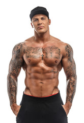 Wall Mural - Awesome muscular man with tattoo