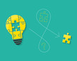 © lvnl - Lightbulb with missing puzzle piece as idea and solution concept