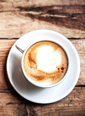 Poster - Cup of Coffee for breakfast on rustic wooden table, top view. Ca