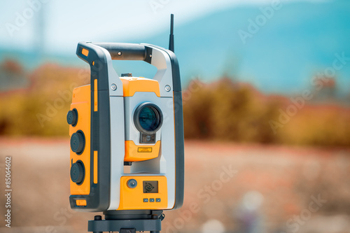 Theodolite or surveyor equipment tacheometer outdoors at