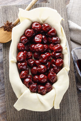 Poster - French puff pastry with cherries before baking