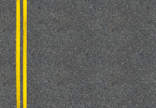 Asphalt Road Top View With Two Yellow Lines
