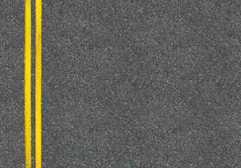asphalt road top view with two yellow lines