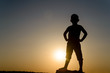 © Daddy Cool - Silhouette of Boy Standing with Hands on Hips