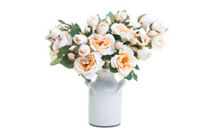 Bouquet Of Artificial Wild Roses In A Vase Isolated On White Background