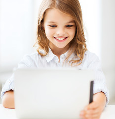 Poster - girl with tablet pc at school