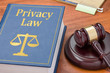 A law book with a gavel - Privacy law