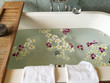 © RooM The Agency - Frangipani flowers floating in a bath tub