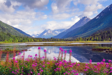 alaska mountain range and reflecting lake on the kenai peninsula