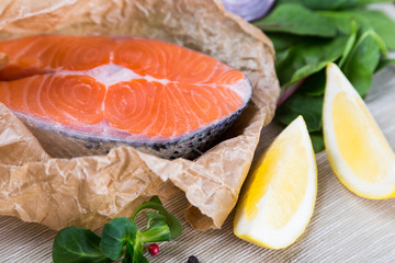 steak of fresh salmon on crushed brown paper