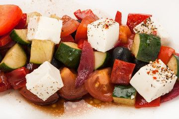 closeup salad from colored fresh vegetables