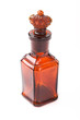 glass brown retro bottle with stopper crown