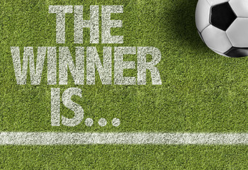 Wall Mural - soccer field with the text: the winner is...