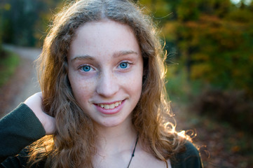 teen girl outdoors in fall