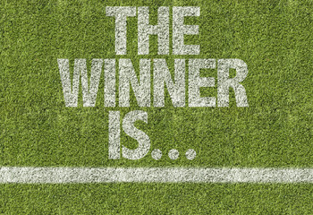 Wall Mural - soccer field with the text: the winner is...