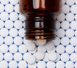Aspirin in Rows With Bottle on Top