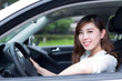 © zhu difeng - Beautiful young asian woman driving car