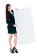 © iPortret - Full-length portrait of young businesswoman holding blank board against white background