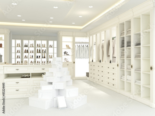 großer offener kleiderschrank mit vielen schuhkarton – Stock