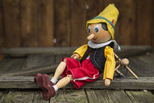 Old Wooden Pinocchio Marionette Toy .
