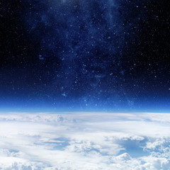 Wall Mural - clouds of earth planet and star sky on the background. elements of this image are by nasa