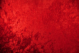 Fototapeta  - Red Velvet Holiday Background crushed red velvet for Christmas and Valentine's Day themes. 