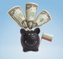 One dollar banknotes in a happy piggybank of Bulgaria.(series)