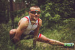 © Fxquadro - Male in sportswear doing body extension