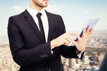 Poster - Composite image of mid section of a businessman 