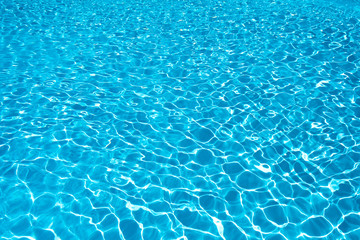 Wall Mural - Bright water surface in swimming pool