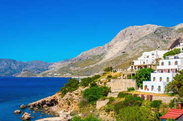 Typical Greek houses on coast of Aegean Sea Greece