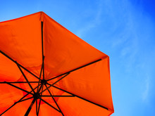 Red Umbrella And Blue Sky