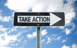 © gustavofrazao - Take Action direction sign with sky background