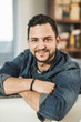 © Westend61 - Portrait of smiling young man at home