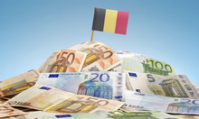 Flag Of Belgium Sticking In A Pile Of Various European Banknotes
