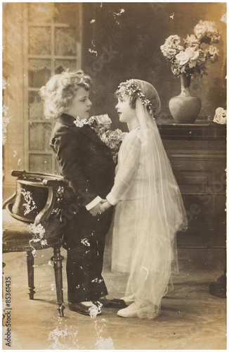Juliste Vintage photo of cute children in wedding dress
