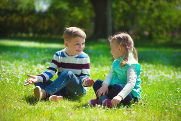 Happy little brother and sister playing