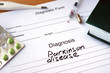 Diagnostic form with Diagnosis Parkinson disease  and pills. 