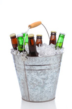 Assorted Beer Bottles In A Bucket Of Ice