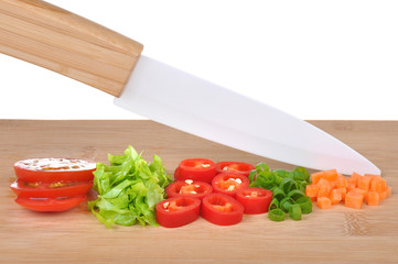 Ceramic knife and vegetables