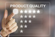 © pichetw - business hand pushing product quality on virtual screen