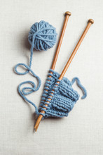 Incomplete Knitting Project With Wooden Needles