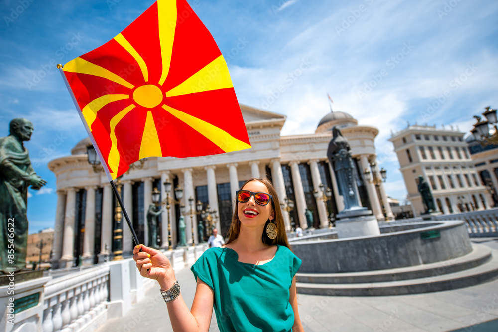 Obraz na płótnie Woman with macedonian flag in Skopje city center w salonie