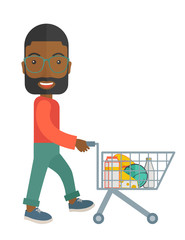 Canvas Print - Black Male Shopper Pushing a Shopping Cart.